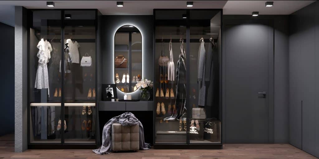Mr. Wardrobe offers a bespoke walk-in closet in London, featuring glass doors and a mirror.