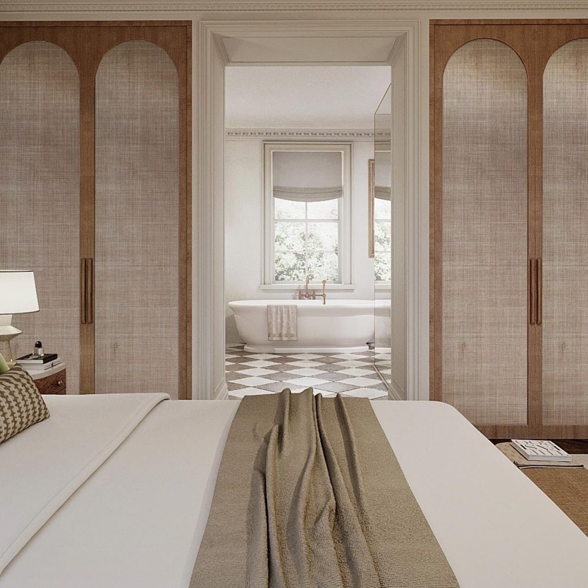 A bedroom in London with a large bed and a bespoke bathroom.